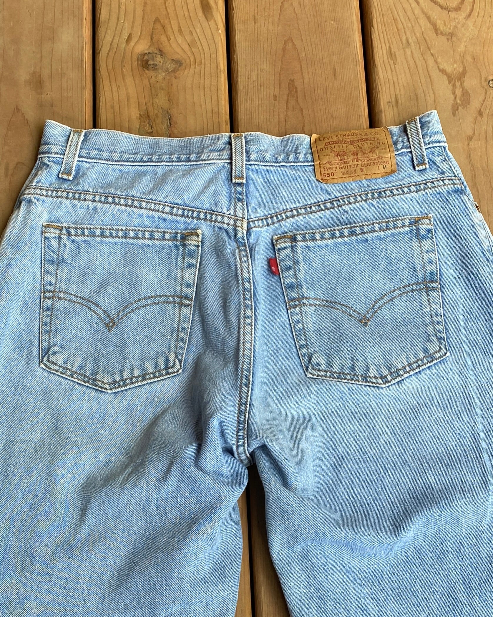 Vintage 1990s Levis 550 Relaxed Fit Light Wash Jeans size 32