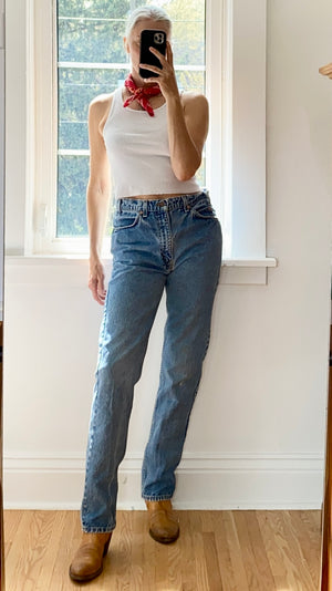 Vintage 1990s Orange Tab Levis Medium Wash Denim Jeans made in USA Size 31 or 32