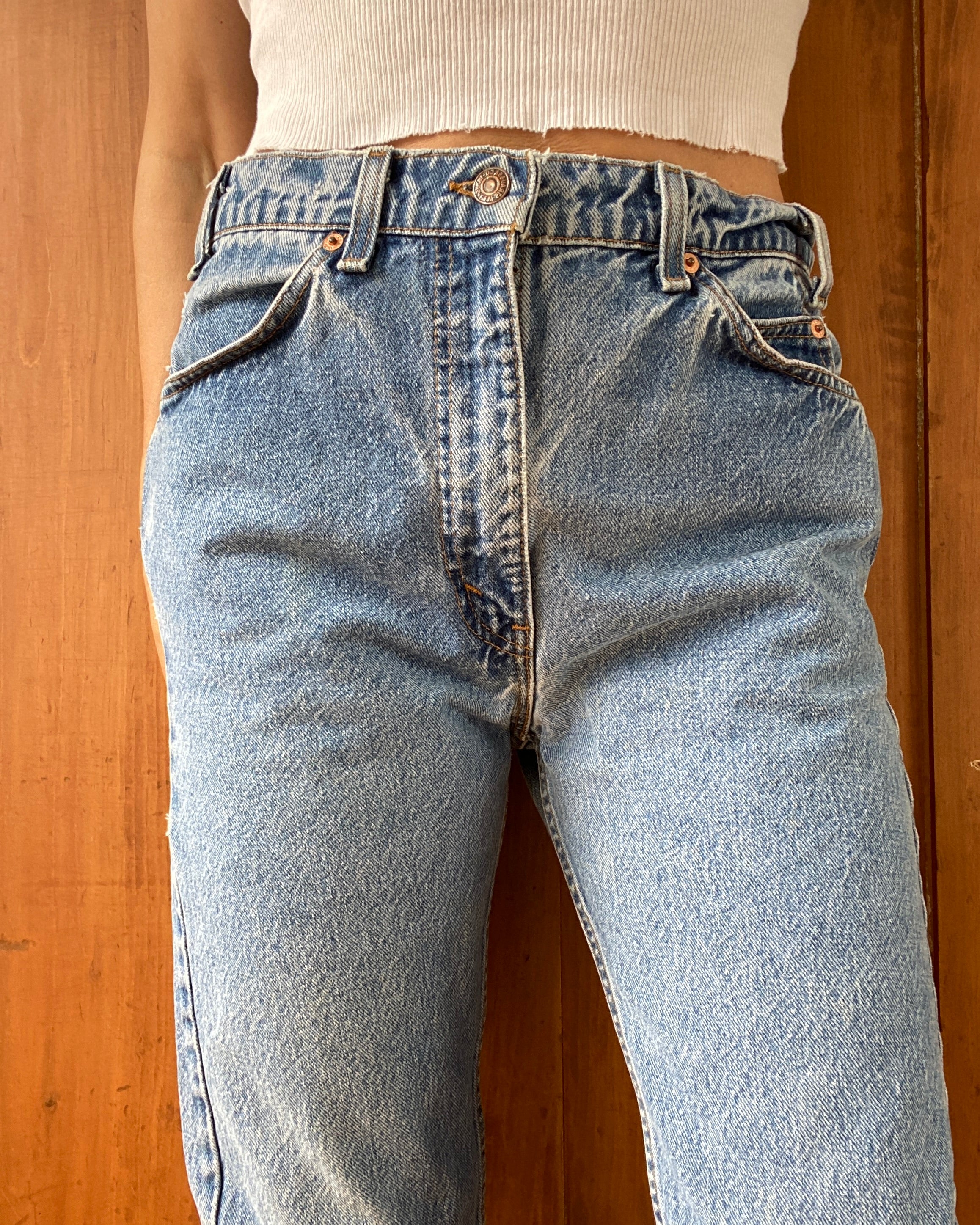 Vintage 1990s Orange Tab Levis Medium Wash Denim Jeans made in USA Size 31 or 32