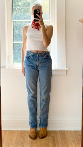Vintage 1990s Orange Tab Levis Medium Wash Denim Jeans made in USA Size 31 or 32