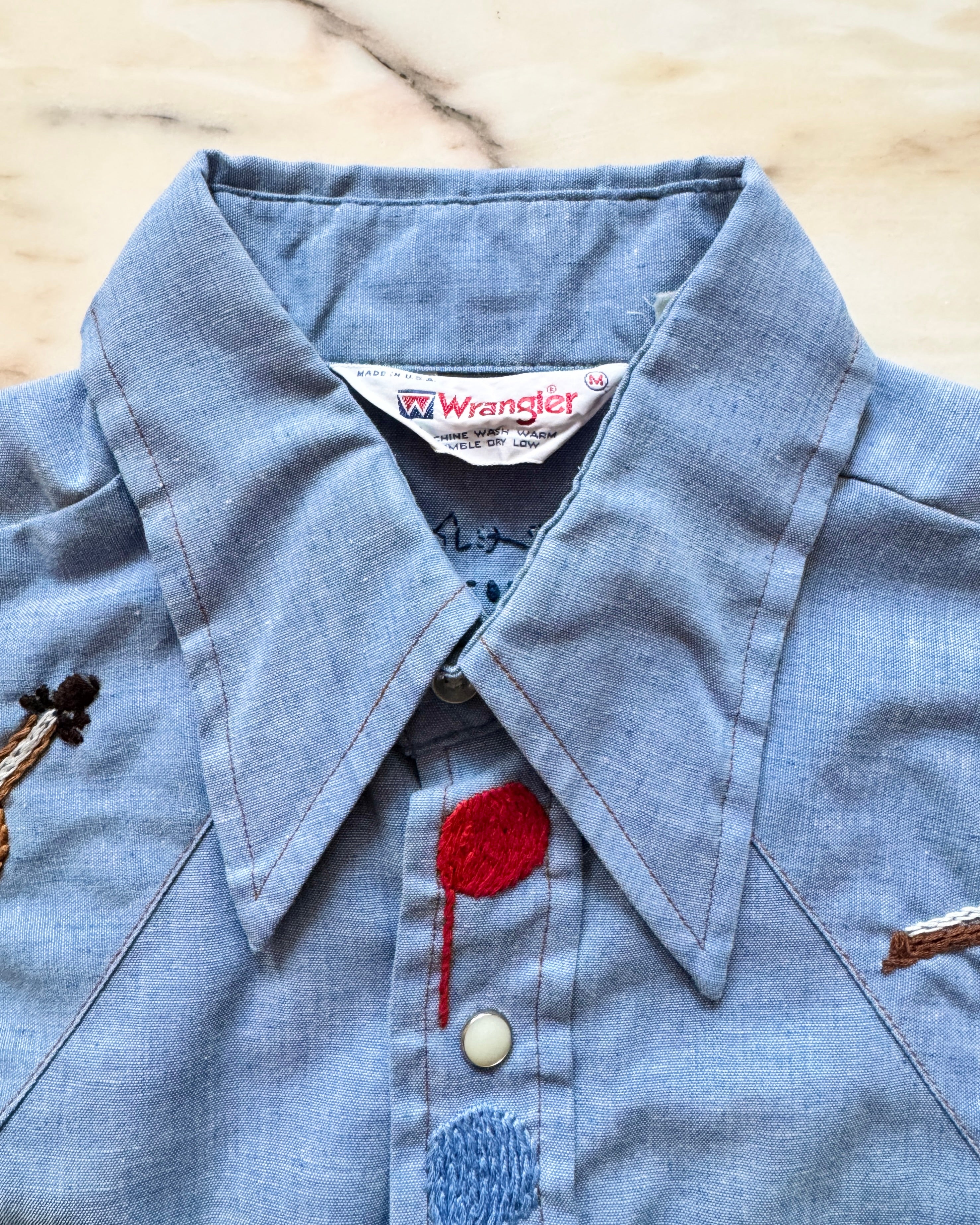 Vintage 1960s 1970s WRANGLER Pearl Snap Button Cowboy Western Rodeo Style Chambray Embroidered Music Jean Shirt Made in USA