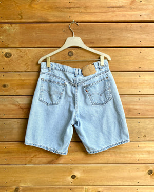 Vintage 1990s Levis 550 Orange Tab Hemmed Jean Shorts Light Wash Made in USA Size 33