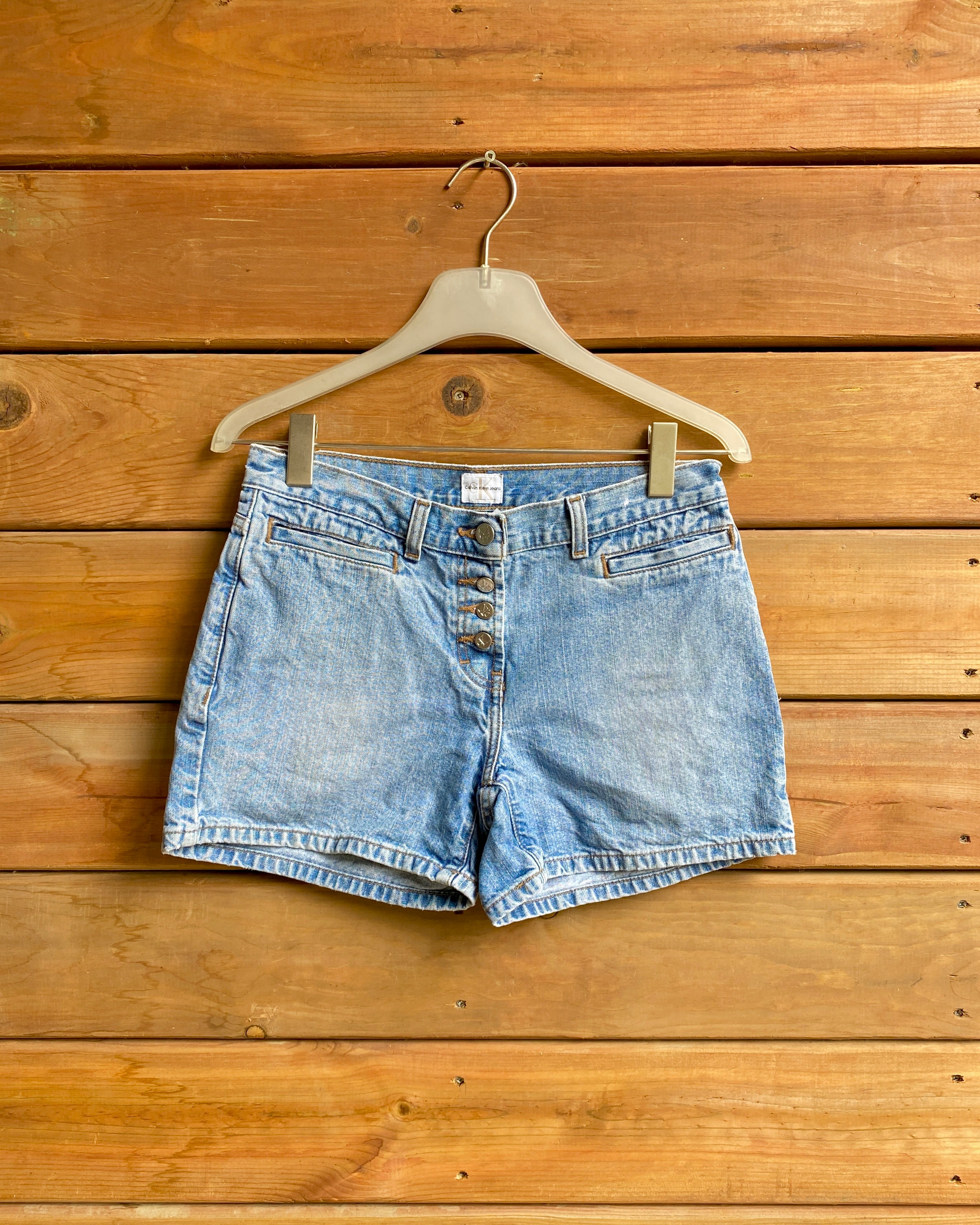Vintage Y2K CALVIN KLEIN Hemmed Low Waist Jean Shorts with Button Fly Size 28 to 29