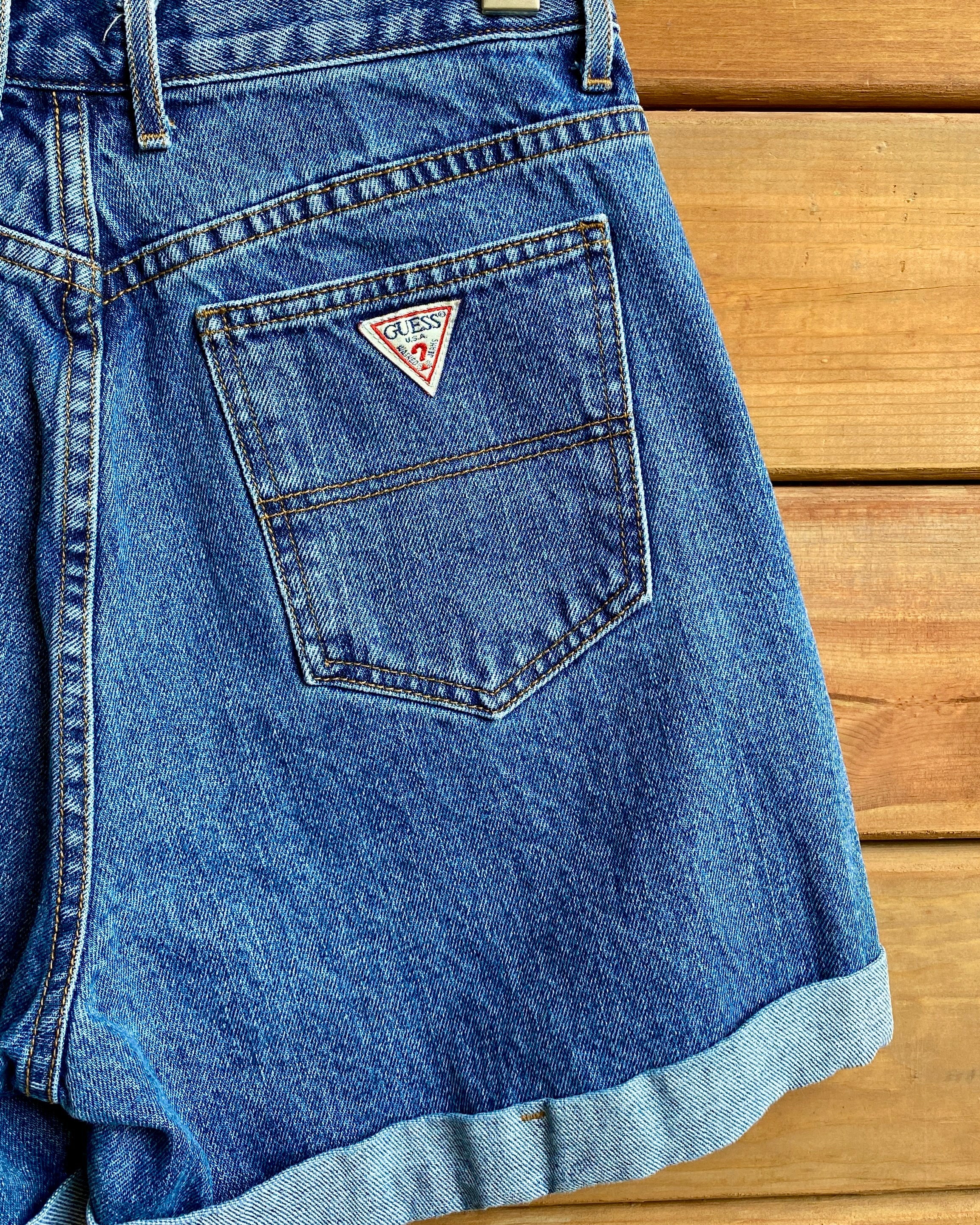 Vintage 1990s GUESS JEANS Cuffed Jean Shorts Dark Wash size 30 Made in USA