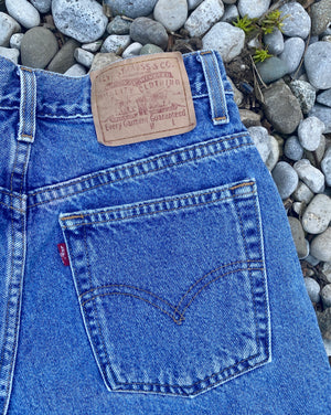 Vintage 1990s Levis Medium Wash Denim High Waist Jean Shorts size 28