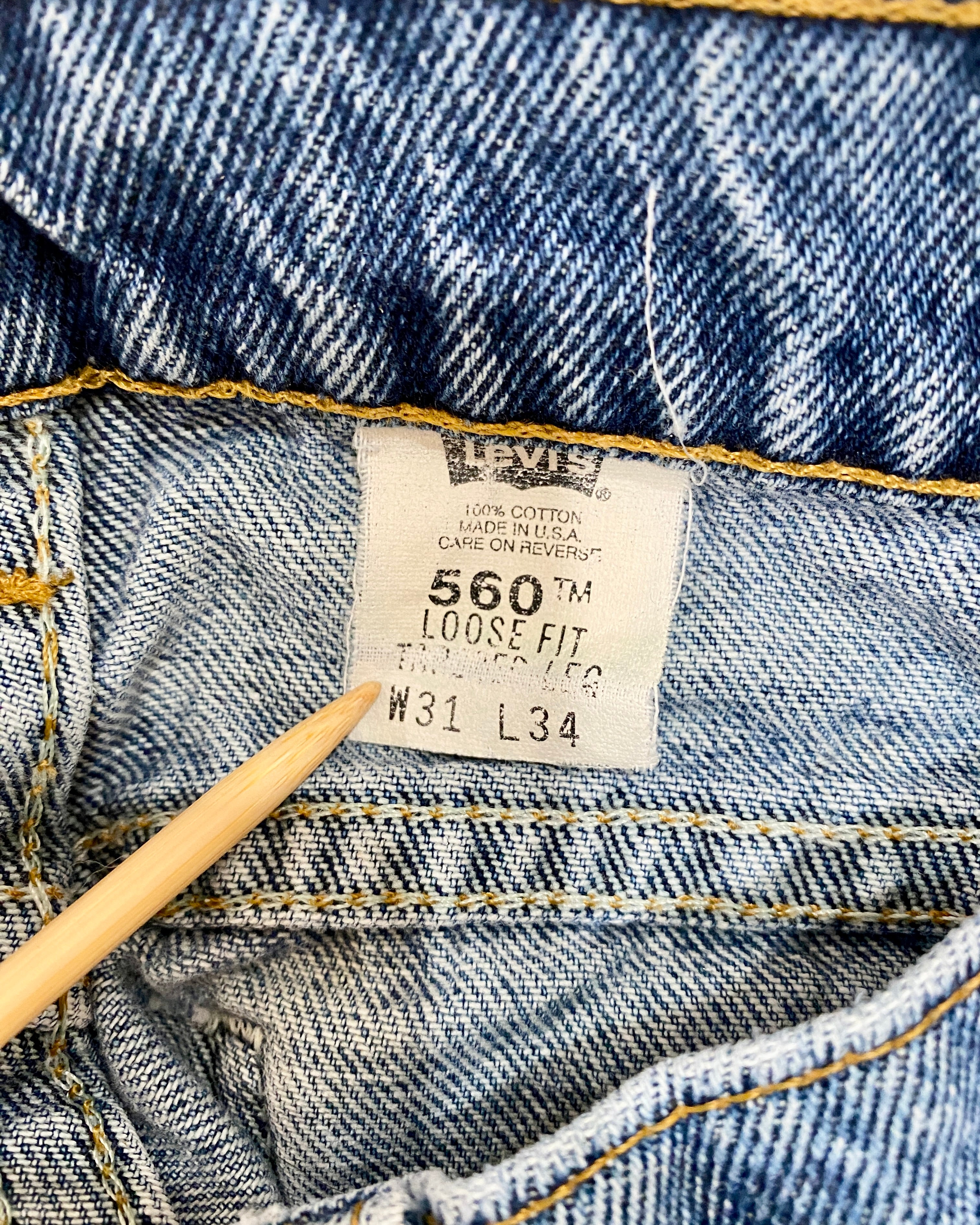 Vintage 1980s Levis 560 Orange Tab Loose Fit Medium Wash Jeans size 30 Made in USA