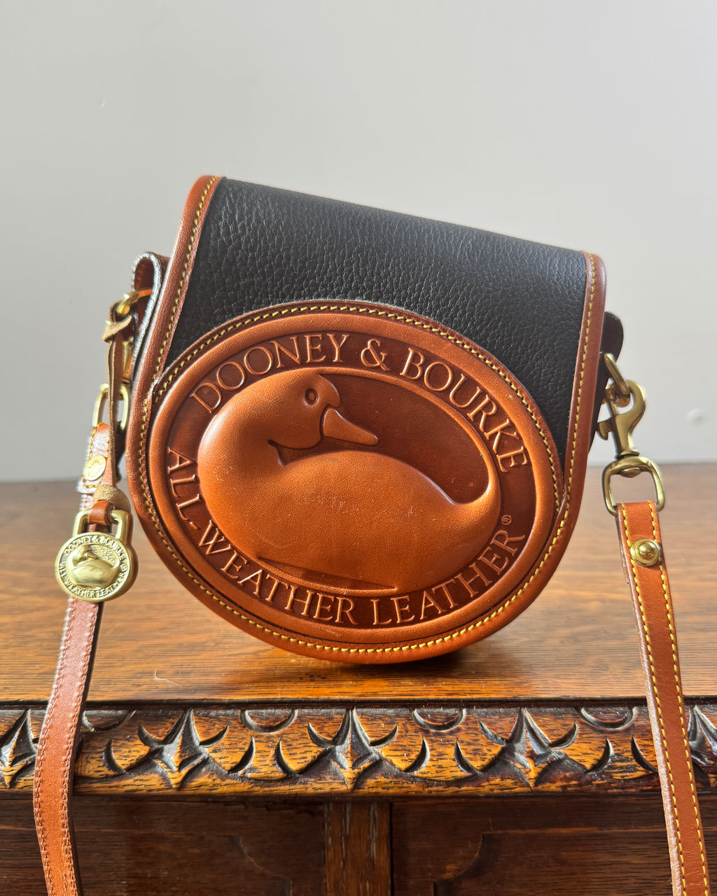Vintage Authentic Dooney & Bourke All Weather Leather Big Duck Crossbody Shoulder Bag Black and Tan Made in USA