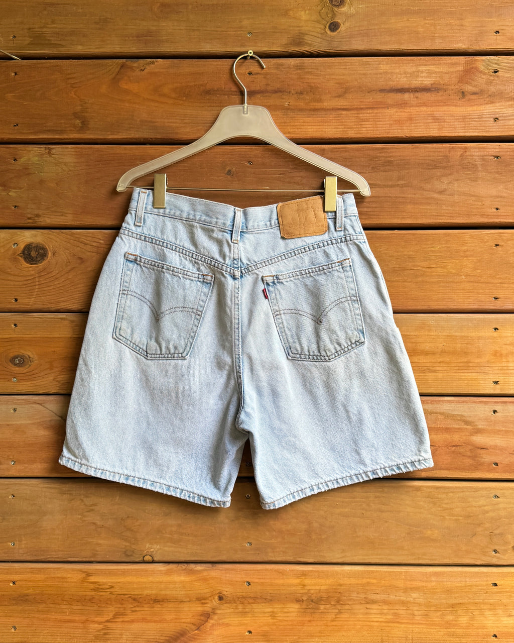 Vintage 1990s Red Tab Levis 550 High Waist Relaxed fit Light Wash Hemmed Denim Jean Shorts Paper Tag Size 31 Waist Made in USA