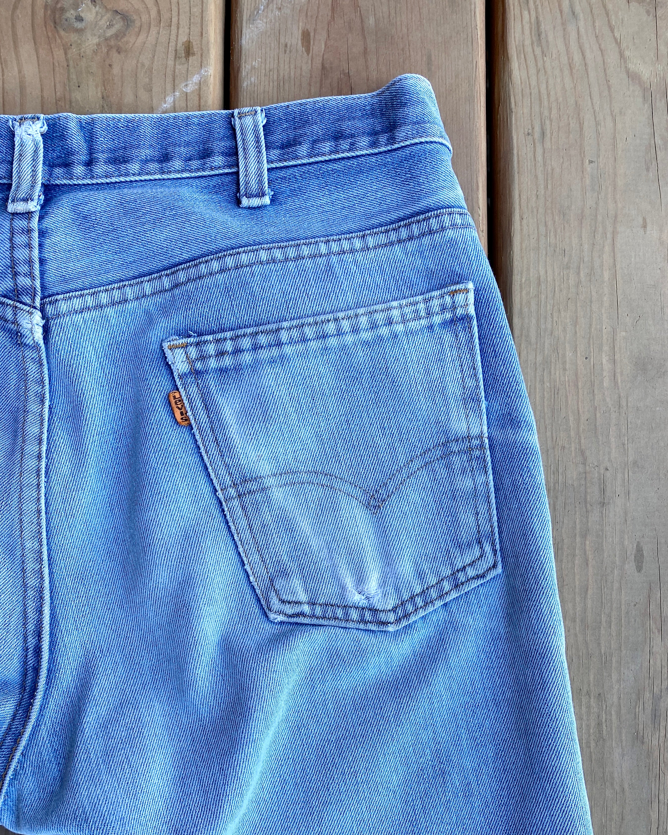 Vintage 1970s Levis Flare Orange Tab Jeans Light Wash size 34 Made in USA