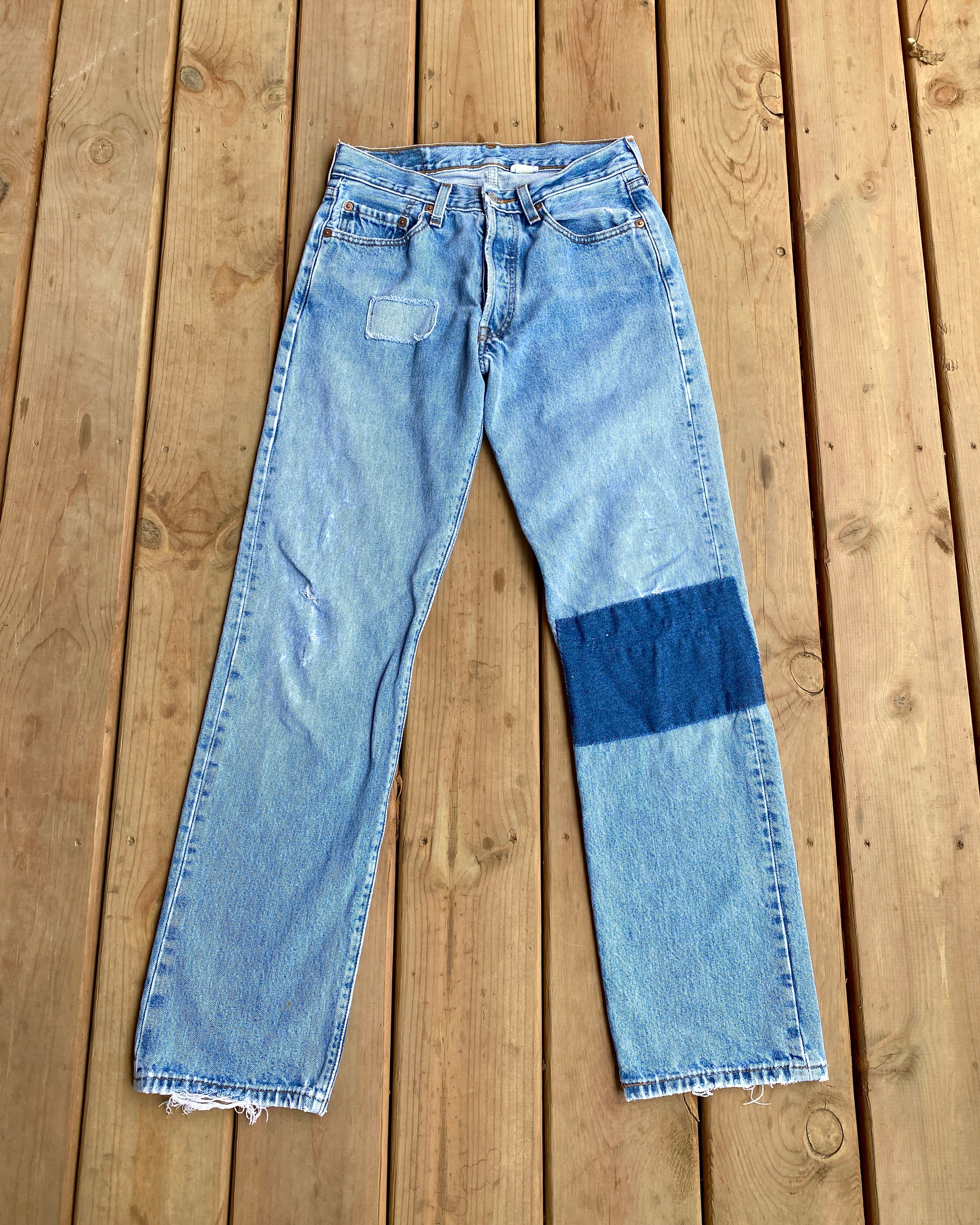 Vintage 1990s Levis 501 Light Wash Patched Jeans size 28