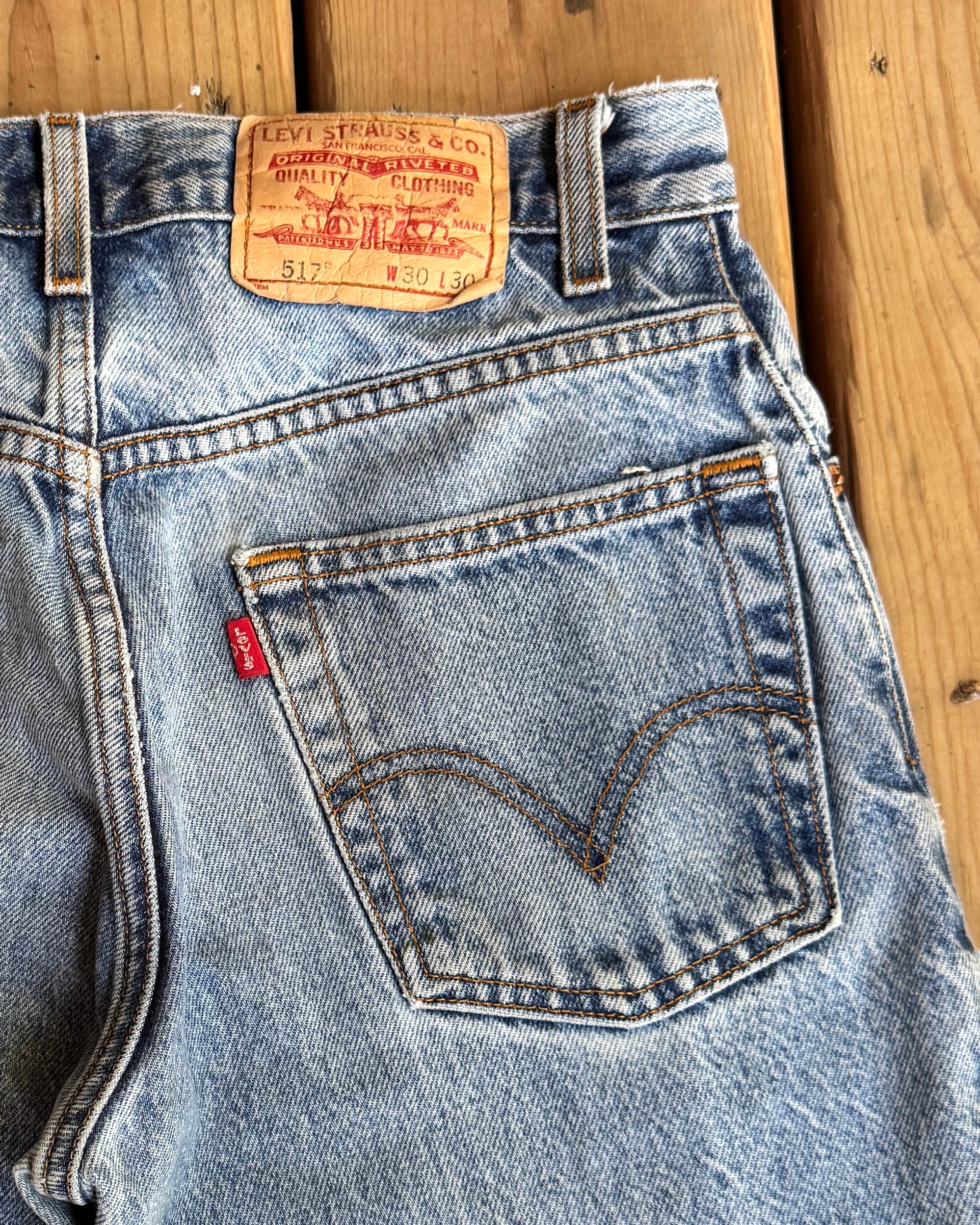 Vintage 90s Levis 517 Boot Cut Distressed Light Blue Wash Jeans Waist 29 Inseam 30