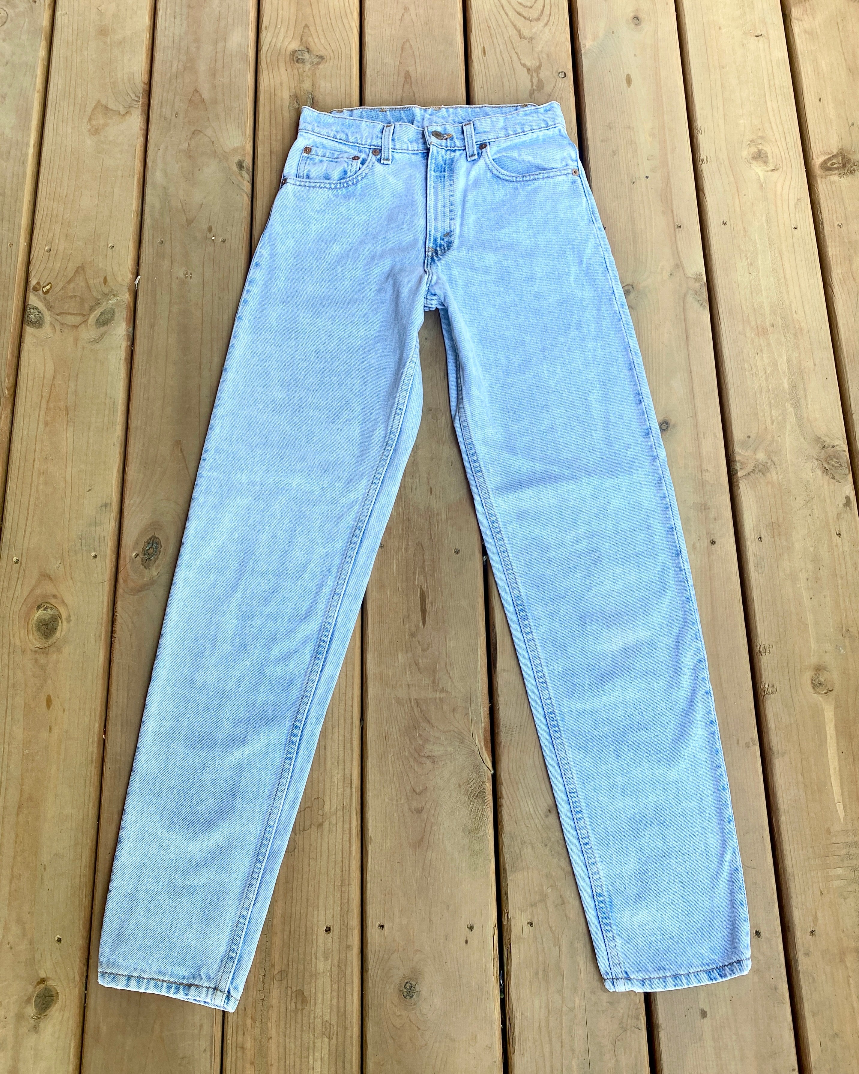 Vintage 1980s Levis 550 Light Wash Jeans size 27 Made in USA