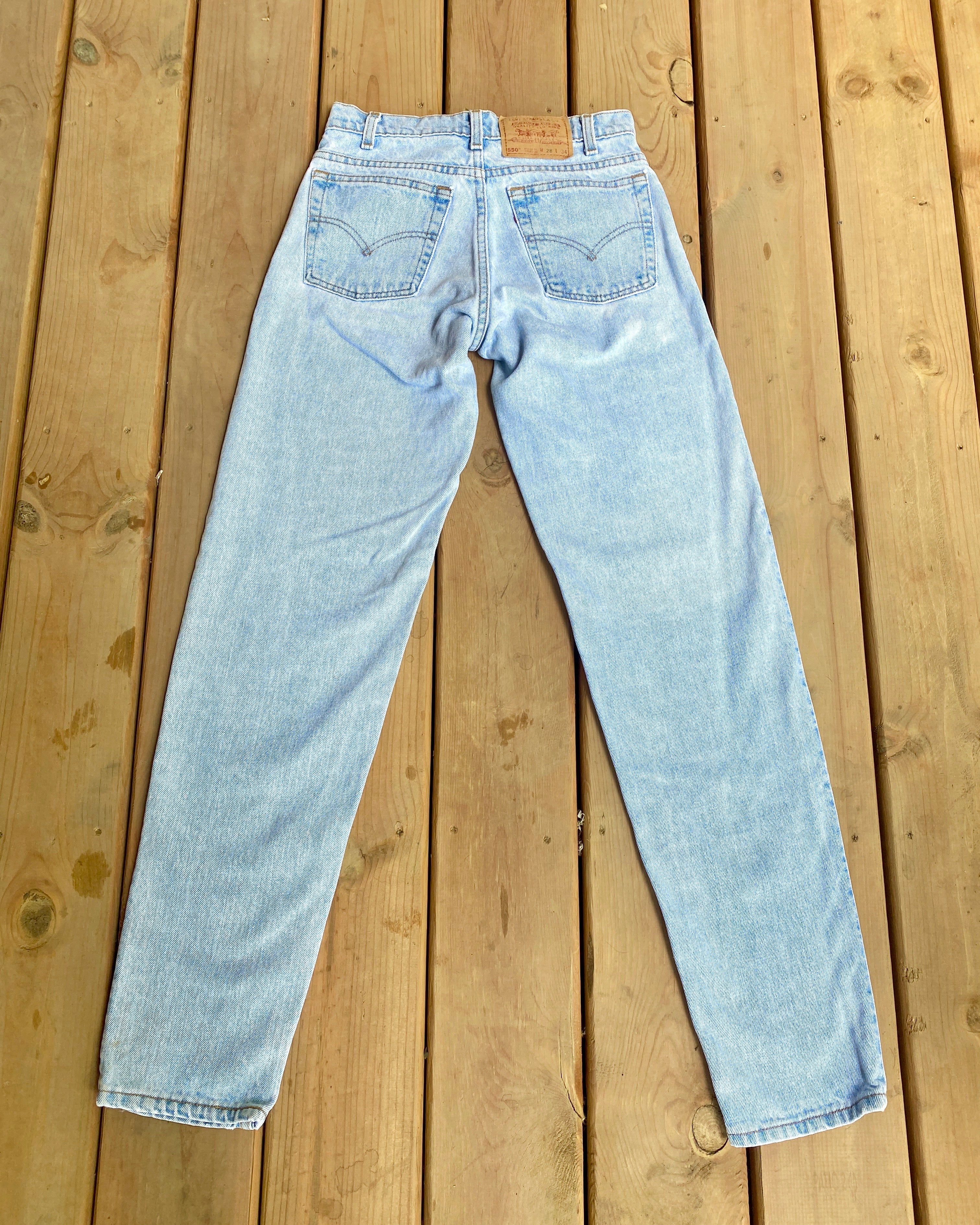 Vintage 1980s Levis 550 Light Wash Jeans size 27 Made in USA
