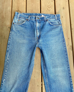 Vintage 1980s Orange Tab Levis 505 Medium Wash Jeans size 36