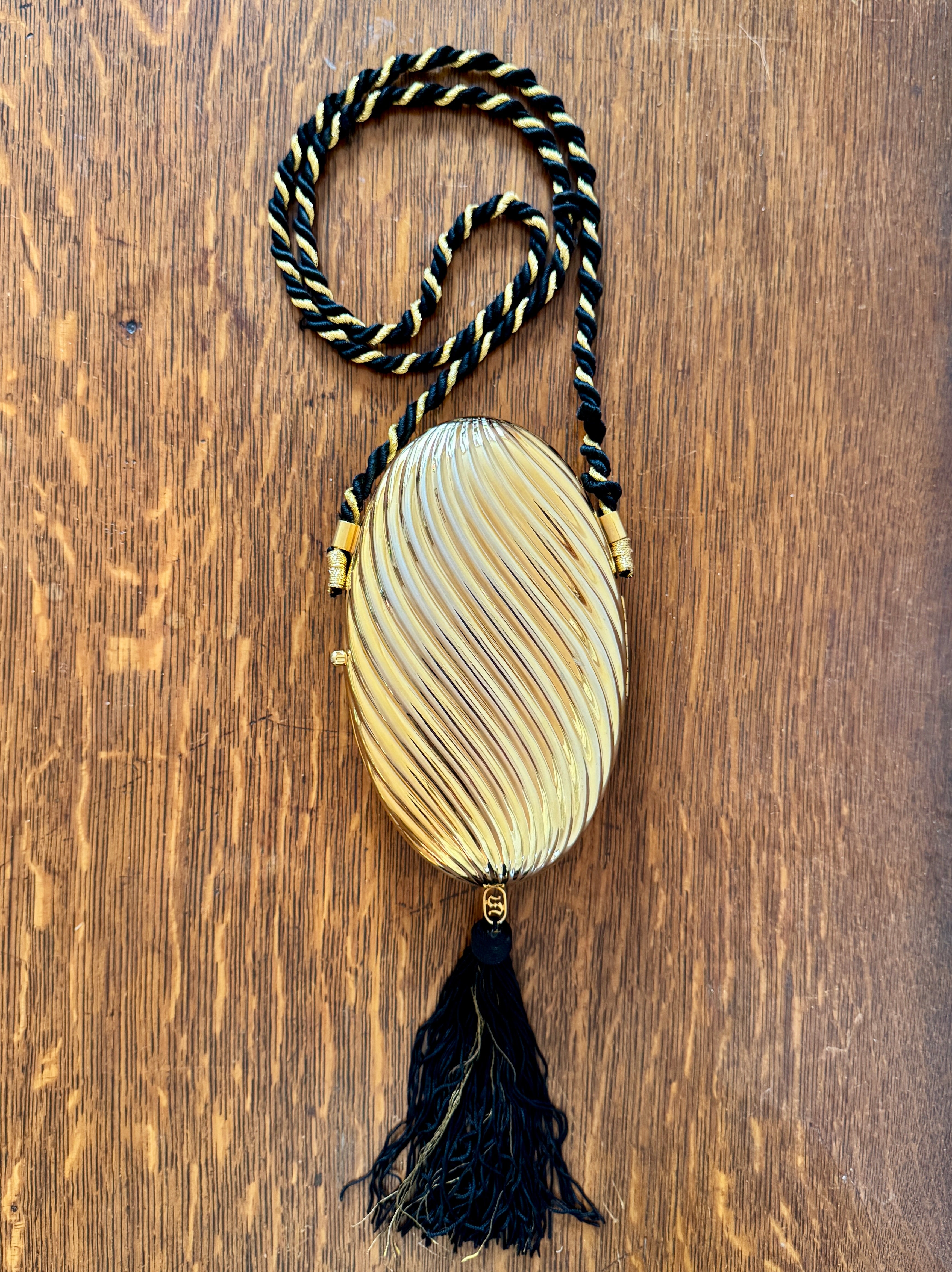 Vintage 1970s SCHEILAN Hard Gold Metal Egg Box Clutch Purse Handbag with Tassel and Rope Chord Strap Made in Italy
