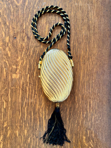 Vintage 1970s SCHEILAN Hard Gold Metal Egg Box Clutch Purse Handbag with Tassel and Rope Chord Strap Made in Italy