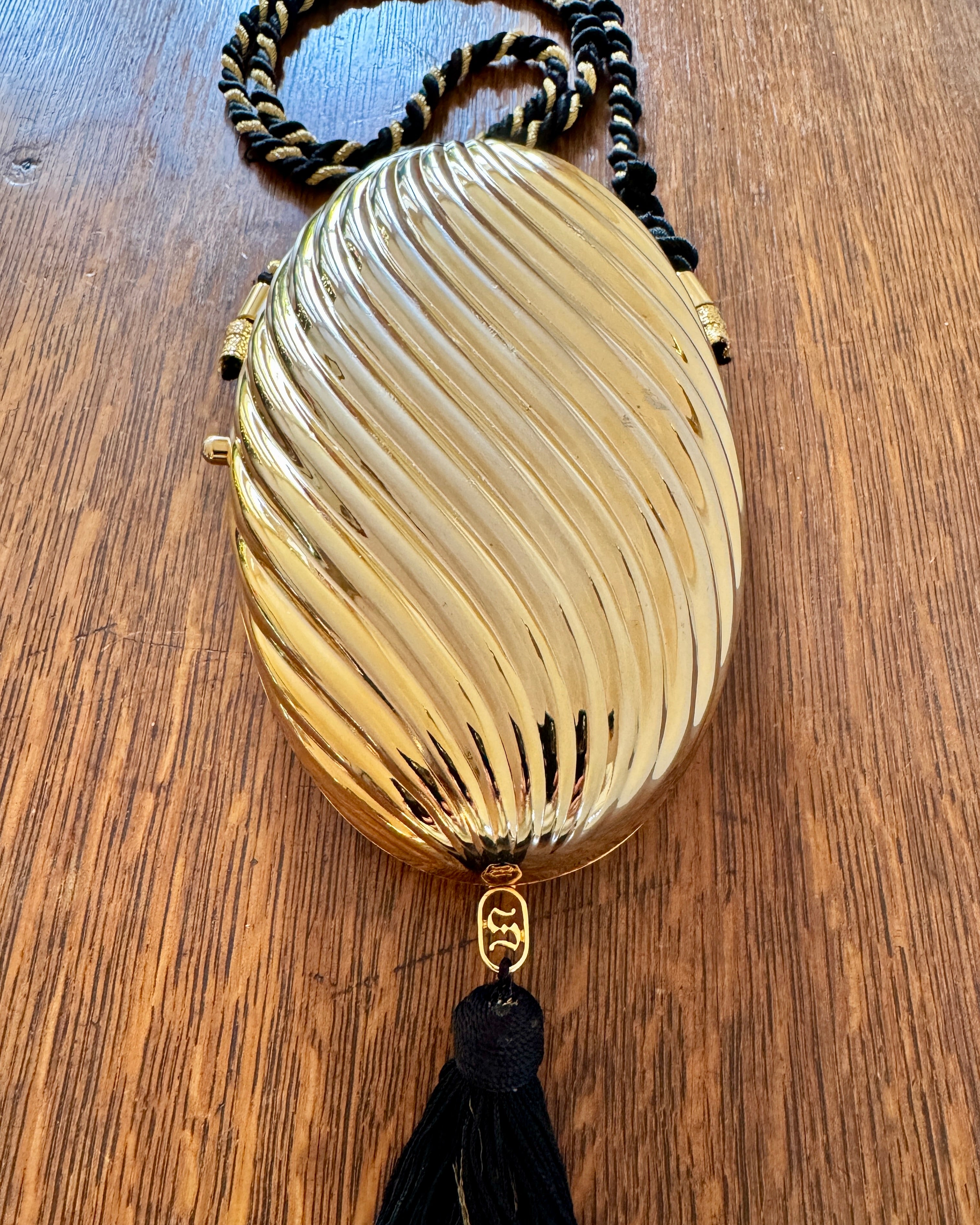 Vintage 1970s SCHEILAN Hard Gold Metal Egg Box Clutch Purse Handbag with Tassel and Rope Chord Strap Made in Italy