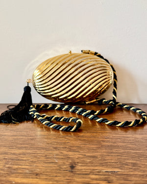 Vintage 1970s SCHEILAN Hard Gold Metal Egg Box Clutch Purse Handbag with Tassel and Rope Chord Strap Made in Italy