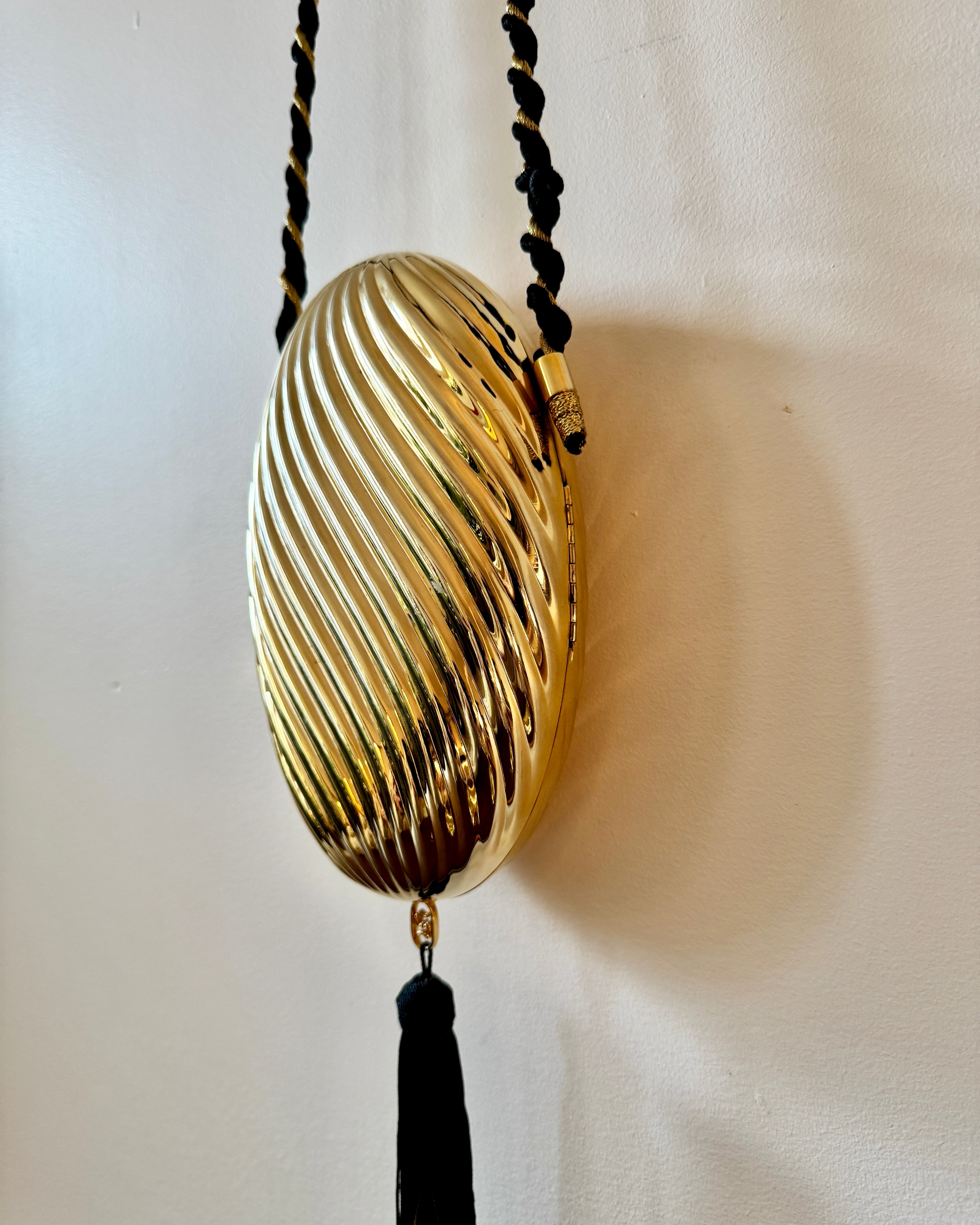 Vintage 1970s SCHEILAN Hard Gold Metal Egg Box Clutch Purse Handbag with Tassel and Rope Chord Strap Made in Italy