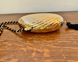 Vintage 1970s SCHEILAN Hard Gold Metal Egg Box Clutch Purse Handbag with Tassel and Rope Chord Strap Made in Italy