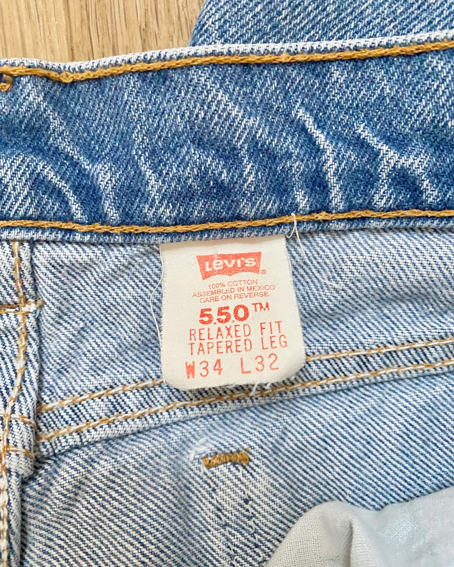 Vintage 1990s Levis 550 Orange Tab Relaxed Fit Medium Wash Jeans size 32