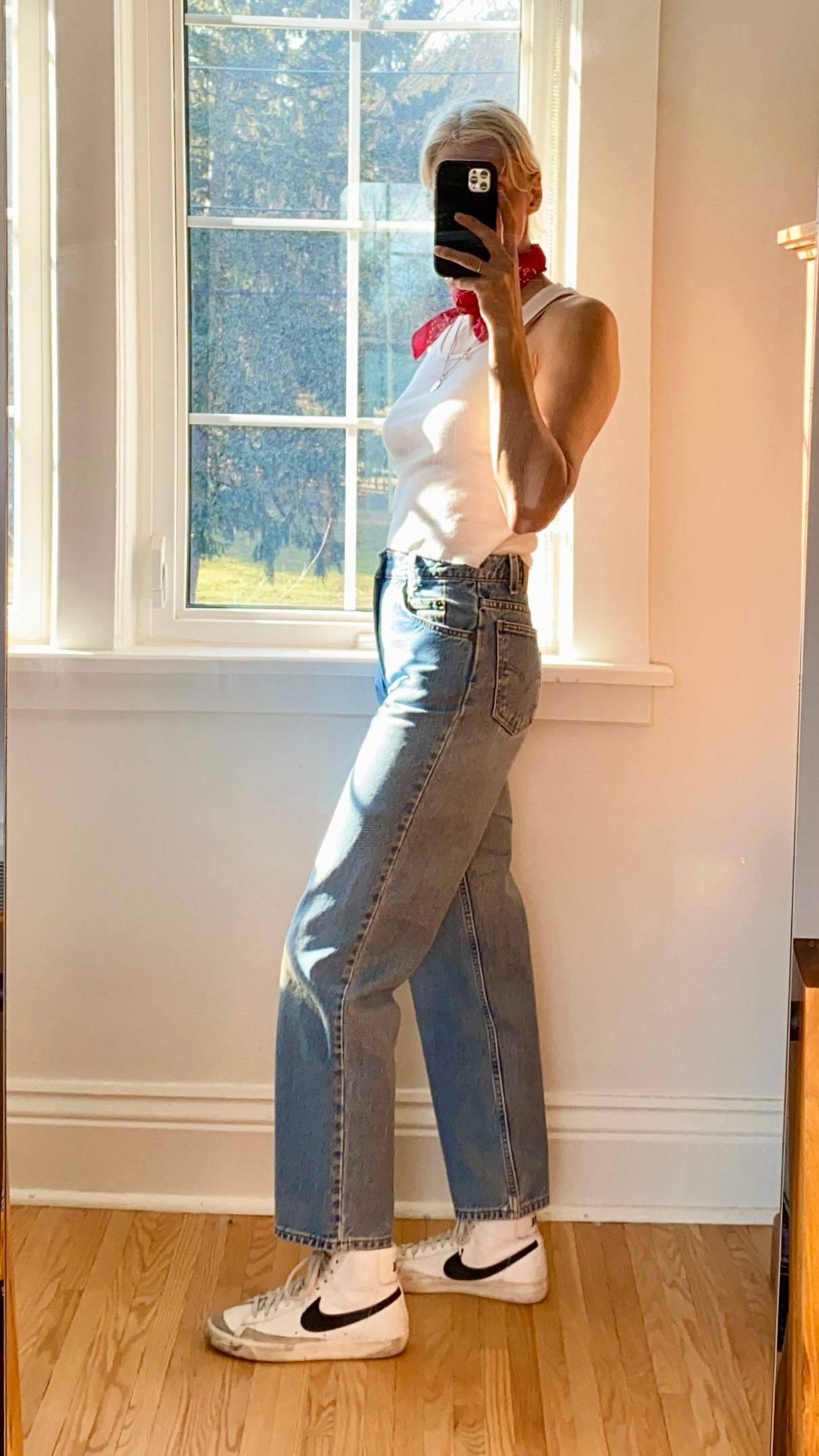 Vintage 1990s Orange Tab Levis 550 Student Light Wash size 28
