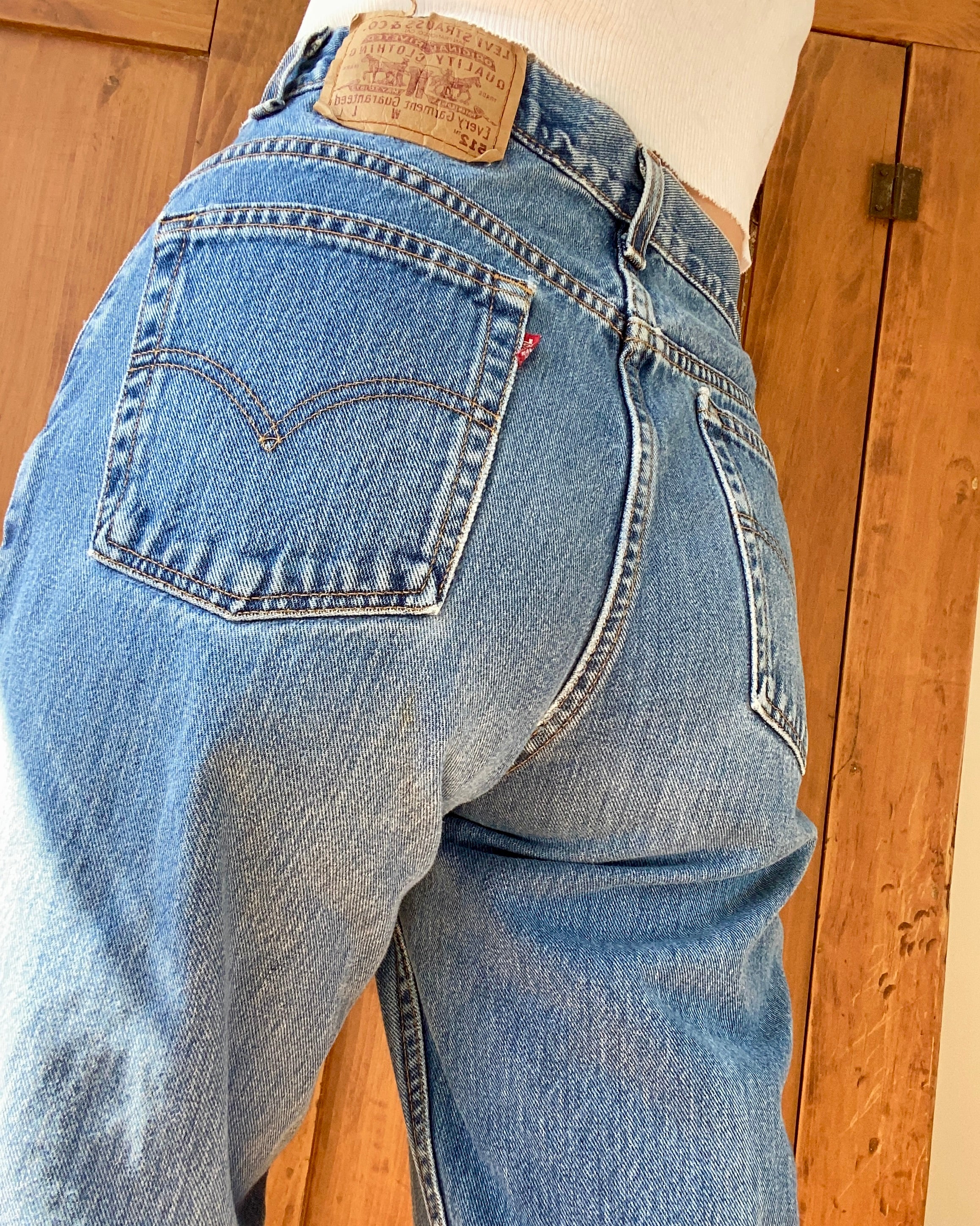 Vintage 1990s Levis 512 High Waist Medium Wash Denim Jeans size 31 Made in USA