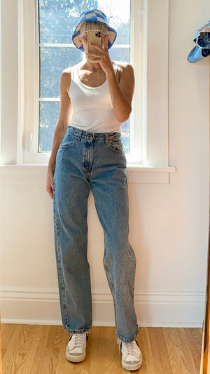 Vintage Levis 565 Medium Wash Jeans Made in USA size 29