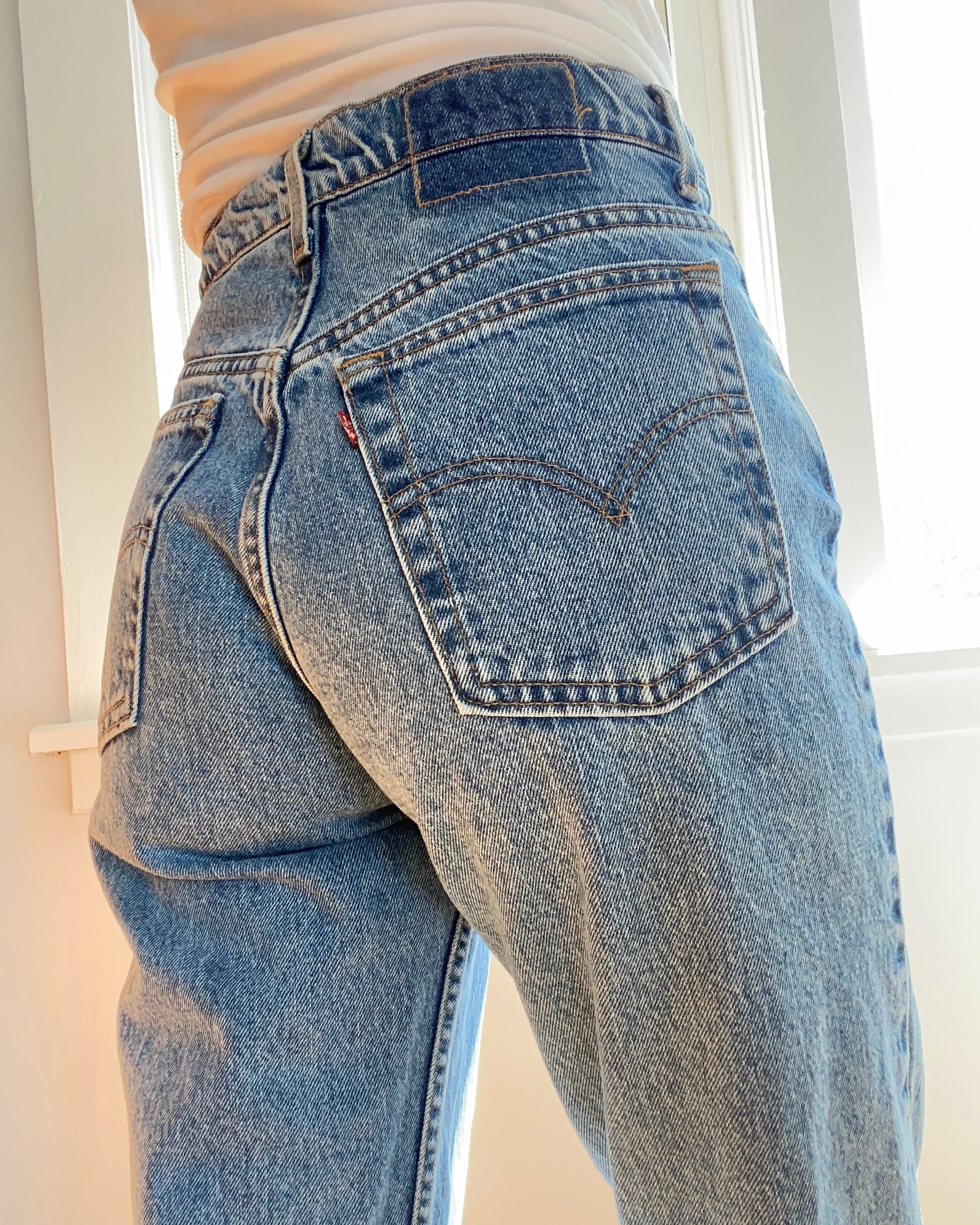 Vintage Levis 565 Medium Wash Jeans Made in USA size 29