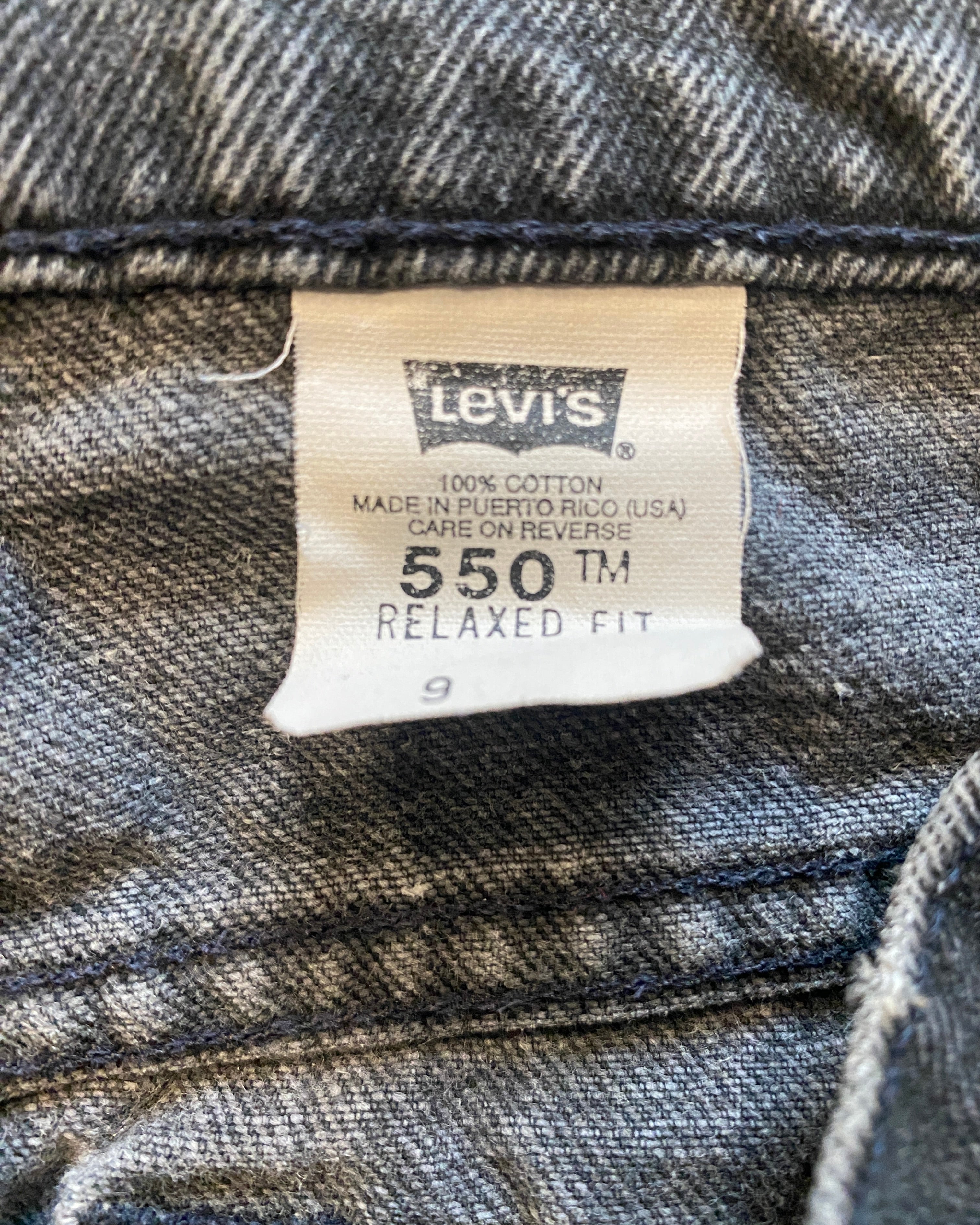 Vintage 1990s Levis 550 Black Wash Denim High Waist Jean Shorts Made in USA size 28