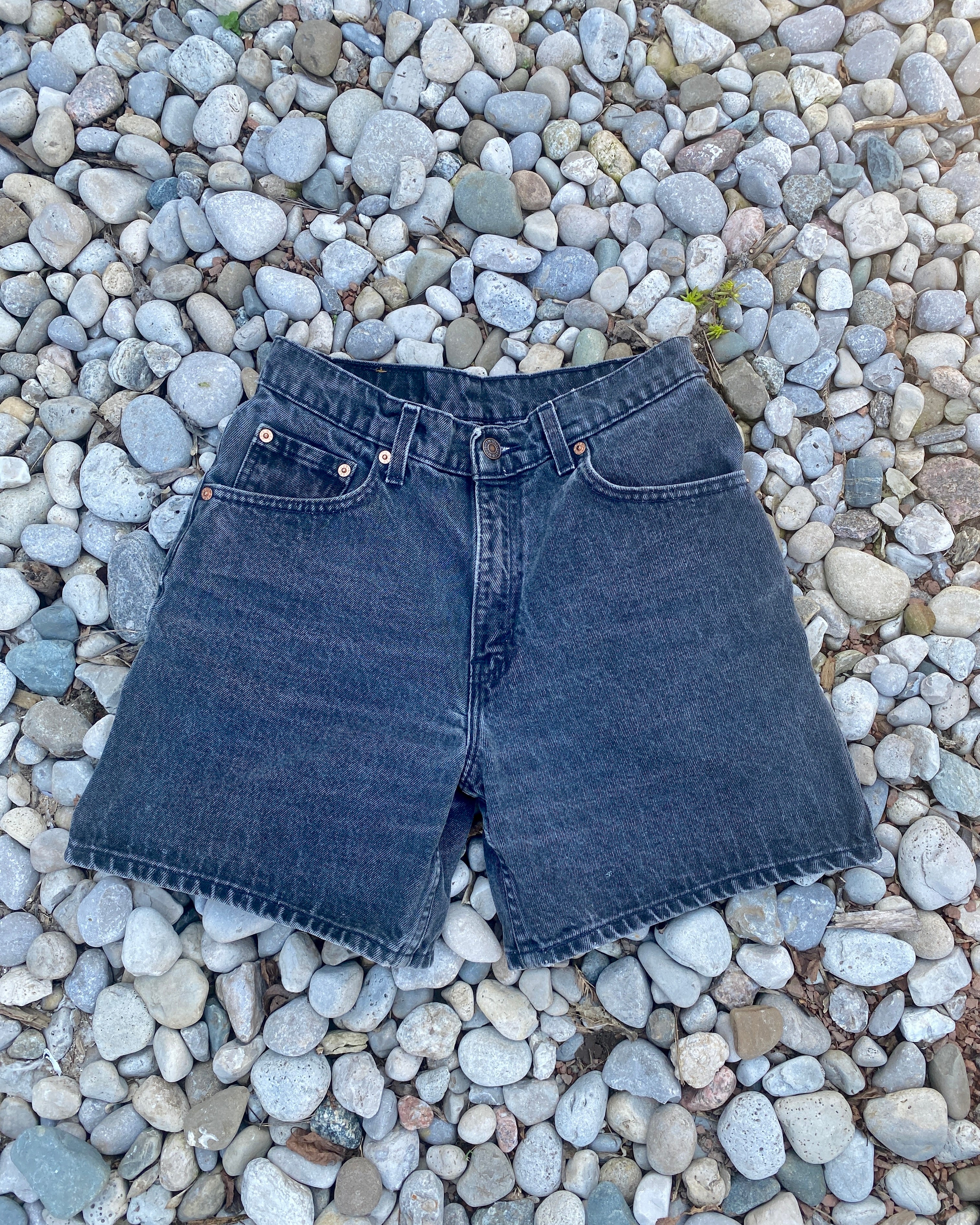 Vintage 1990s Levis 550 Black Wash Denim High Waist Jean Shorts Made in USA size 28