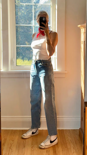 Vintage 1990s Orange Tab Levis 550 Student Light Wash size 28